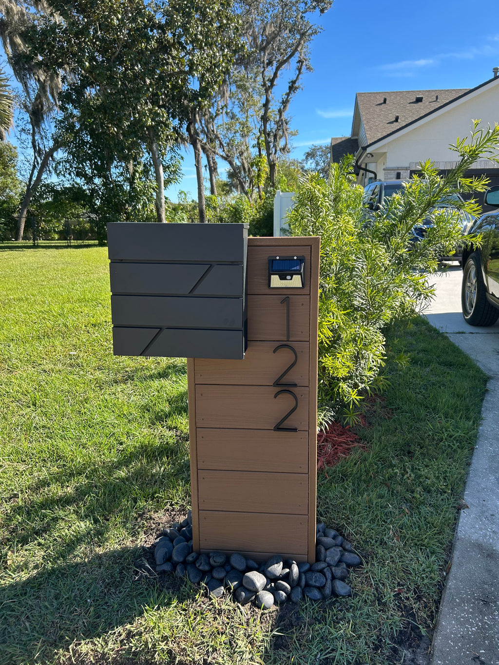 Atena 5.0 composite residential mailbox in saddle color with modern house numbers